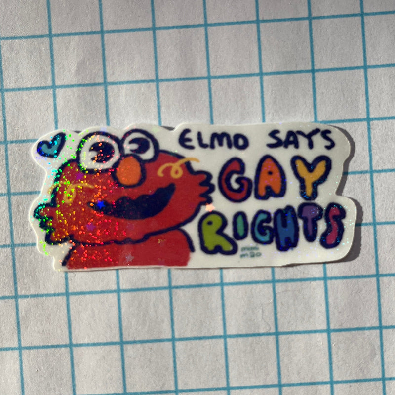 Sticker with Elmo and text 'Elmo says Gay Rights' on a grid background