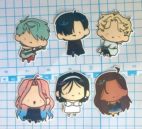 Six cartoon character stickers on a grid background