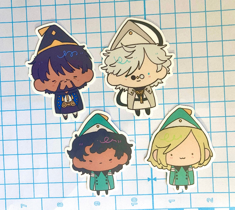 Four cartoon character stickers on a grid background