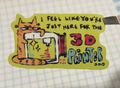 Hand holding a colorful sticker with cartoon cat design on checkered paper